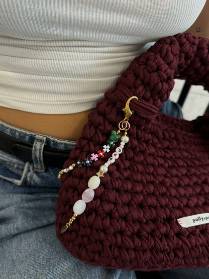 Burgundy bag with a chain